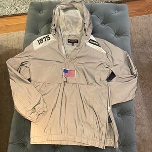 1975 Members Only reflective rain jacket